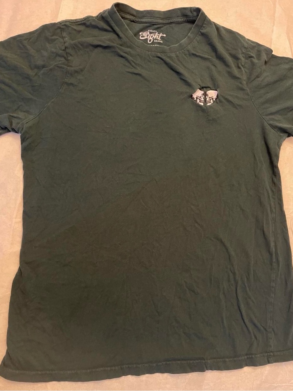 Green cotton t-shirt with skull graphic, size L